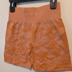 NVGTN Women's High Waisted Camo Bike Shorts in Orange